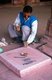 India: A marble artisan at work renovating sections of Fatehpur Sikri, Uttar Pradesh